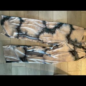 Unworn Cos trousers with elastic waistband and sophisticated abstract print